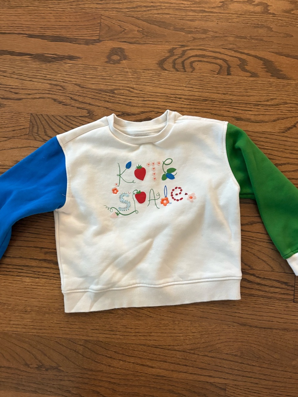 EUC Kate Spade Kids Sweatshirt with Blue & Green Sleeves - Playful Fruit Graphic